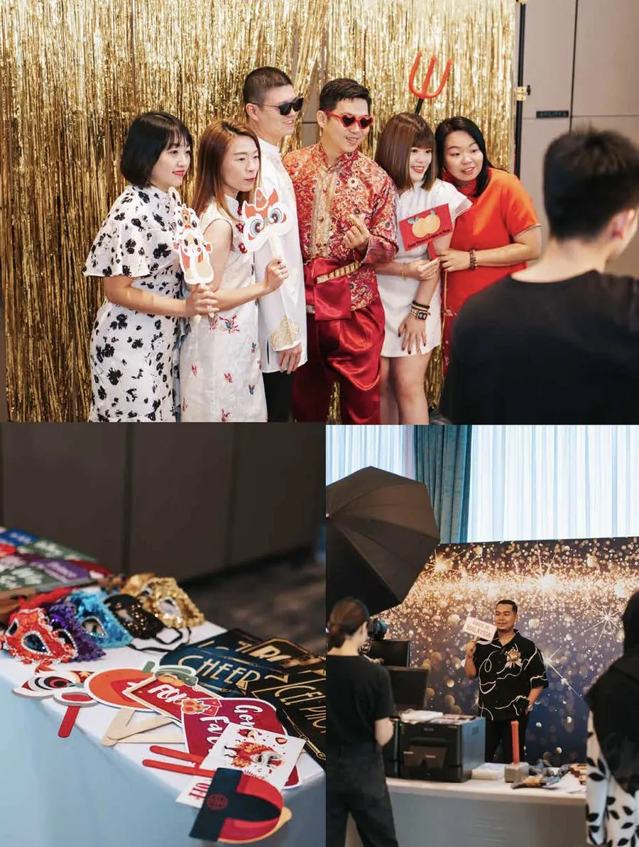 Standard Photobooth at a Penang event: guests posing with props, the props table, and the camera, lighting and printer setup